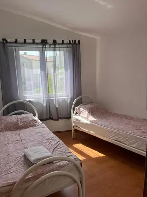 Krevet ili kreveti u jedinici u objektu Bronislovas holiday home 1