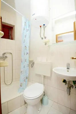 Kupaonica u objektu Apartments Hrgovic