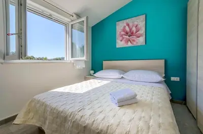 Krevet ili kreveti u jedinici u objektu Family-friendly apartments with swimming pool Razanj - Rogoznica - 24214