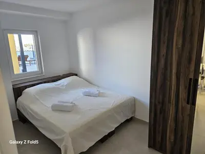 Krevet ili kreveti u jedinici u objektu Dora apartments Jezera