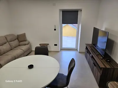 TV i/ili zabavni centar u objektu Dora apartments Jezera