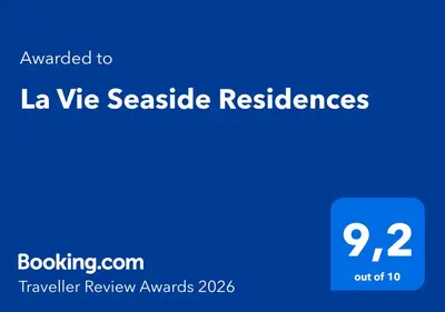 Certifikat, nagrada, logo ili neki drugi dokument izložen u objektu La Vie Seaside Residences