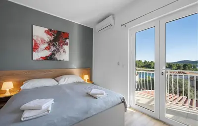 Krevet ili kreveti u jedinici u objektu Awesome Apartment In Pirovac With House Sea View