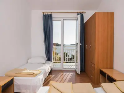 Krevet ili kreveti u jedinici u objektu Apartment in Brodarica by the Beach