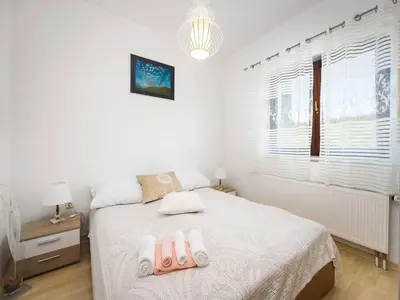 Krevet ili kreveti u jedinici u objektu Apartment in Zaton near Beach Zvizda