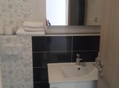 Kupaonica u objektu Cozy Vodice Garden Apartments With Terrace and BBQ