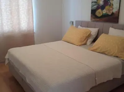 Krevet ili kreveti u jedinici u objektu Cozy Vodice Garden Apartments With Terrace and BBQ