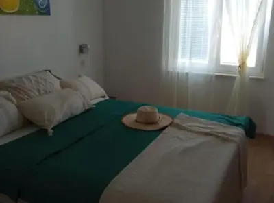 Krevet ili kreveti u jedinici u objektu Cozy Vodice Garden Apartments With Terrace and BBQ