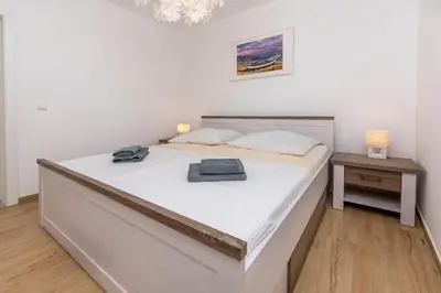 Krevet ili kreveti u jedinici u objektu Apartments Lonamare