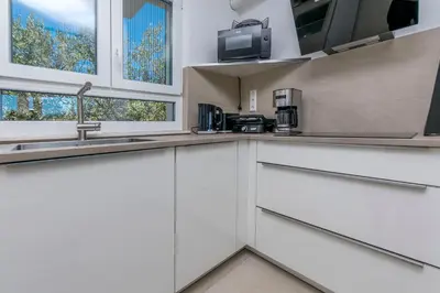 Kuhinja ili čajna kuhinja u objektu Apartments Lonamare