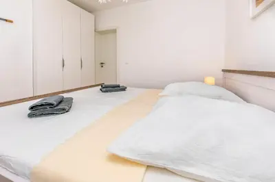 Krevet ili kreveti u jedinici u objektu Apartments Lonamare