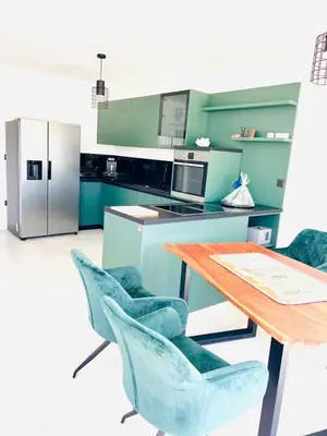 Kuhinja ili čajna kuhinja u objektu Traumhaftes Apartment mit Pool