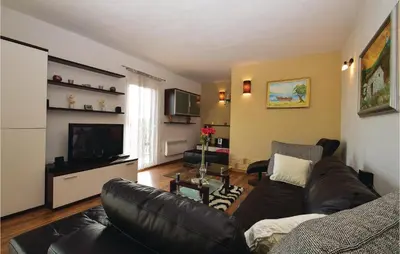TV i/ili zabavni centar u objektu Amazing Home In Unesic With Wifi