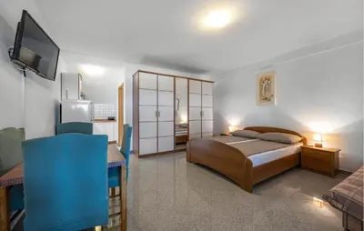 Krevet ili kreveti u jedinici u objektu 2 Bedroom Nice Apartment In Dubravice