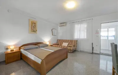 Krevet ili kreveti u jedinici u objektu 2 Bedroom Nice Apartment In Dubravice