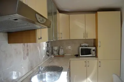 Kuhinja ili čajna kuhinja u objektu Apartments Villa Russo