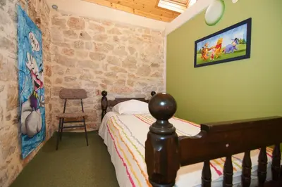 Krevet ili kreveti u jedinici u objektu Seaside house for families with children Krapanj, Sibenik - 24166