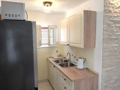 Kuhinja ili čajna kuhinja u objektu Seaside holiday house Sparadici, Sibenik - 24313