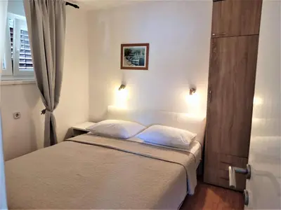 Krevet ili kreveti u jedinici u objektu Seaside holiday house Sparadici, Sibenik - 24313