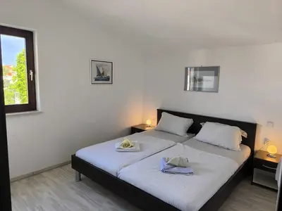 Krevet ili kreveti u jedinici u objektu Apartments Hrvoje