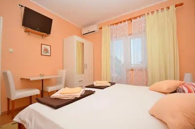 Krevet ili kreveti u jedinici u objektu Apartments and Room Zinka