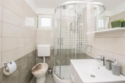 Kupaonica u objektu Apartments and Room Zinka