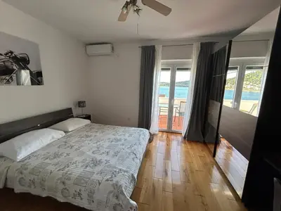 Krevet ili kreveti u jedinici u objektu Apartments Perina Tisno