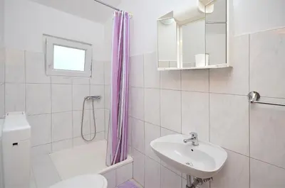 Kupaonica u objektu Apartments Mila Family with pool