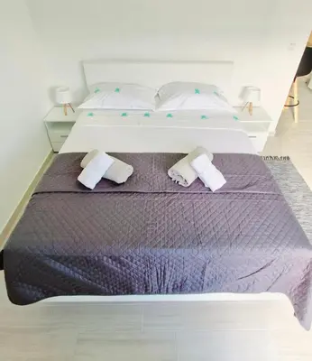 Krevet ili kreveti u jedinici u objektu Apartmani Deniza 2 guests