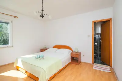 Krevet ili kreveti u jedinici u objektu Apartments Sinisa