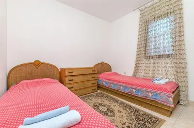 Krevet ili kreveti u jedinici u objektu Apartment Mujan