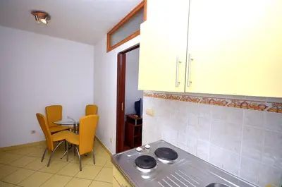 Kuhinja ili čajna kuhinja u objektu Apartments and Rooms Mare
