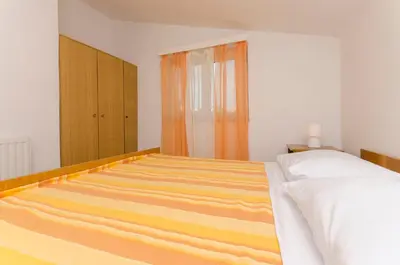 Krevet ili kreveti u jedinici u objektu Apartments Manda