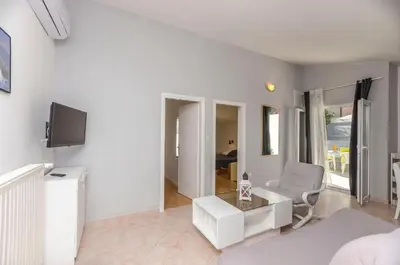 TV i/ili zabavni centar u objektu Apartments Manda