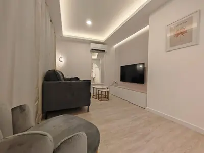 TV i/ili zabavni centar u objektu Apartments Mateo