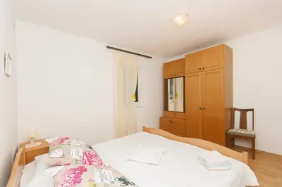 Krevet ili kreveti u jedinici u objektu Apartments Srdan