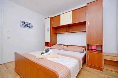 Krevet ili kreveti u jedinici u objektu Apartments Milan