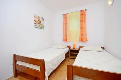 Krevet ili kreveti u jedinici u objektu Apartments Milan