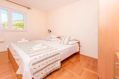 Krevet ili kreveti u jedinici u objektu Apartments Toni