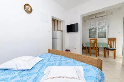 TV i/ili zabavni centar u objektu Apartments Mime