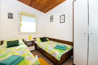 Krevet ili kreveti u jedinici u objektu Apartments Snjezana