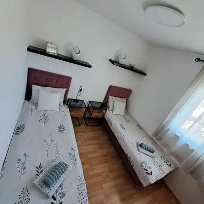 Krevet ili kreveti u jedinici u objektu Ferienwohnung-Srima-Kroatien