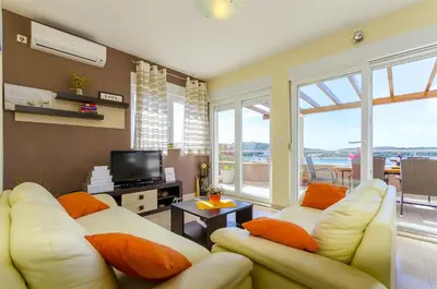 TV i/ili zabavni centar u objektu Apartments Smilje