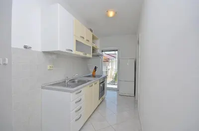 Kuhinja ili čajna kuhinja u objektu Apartments Sime
