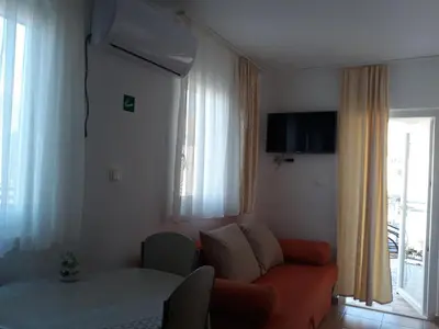 TV i/ili zabavni centar u objektu Apartments Pemita
