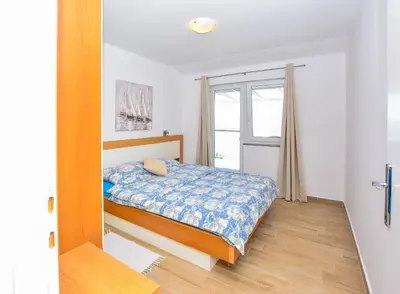 Krevet ili kreveti u jedinici u objektu Apartments Mijo
