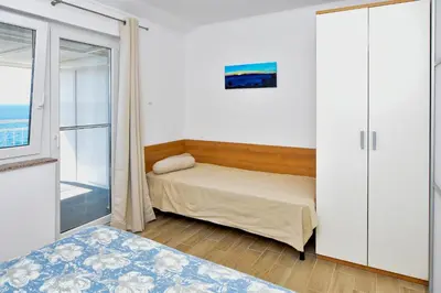 Krevet ili kreveti u jedinici u objektu Apartments Mijo