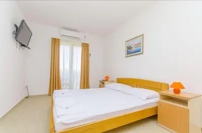 Krevet ili kreveti u jedinici u objektu Apartments Tiho i Pave