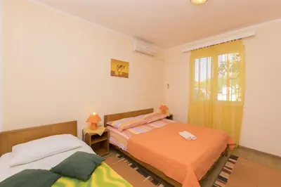 Krevet ili kreveti u jedinici u objektu Apartment and Room Ivica