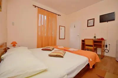 Krevet ili kreveti u jedinici u objektu Apartment and Room Ivica